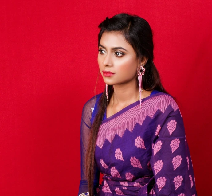 woman in blue and white floral robe