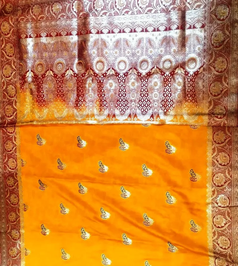 [003] The Turmeric Yellow Saree
